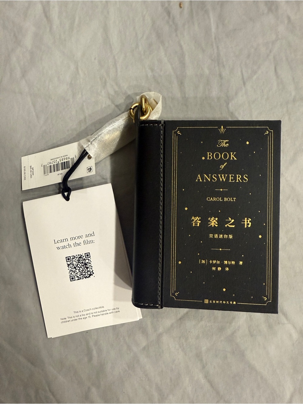 Coach The book of answers by Carol Bolt Book bag charm